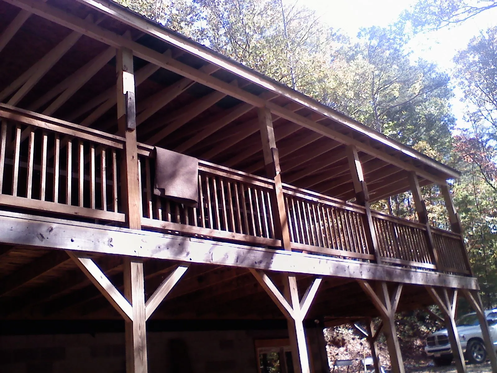 Timber framing under a new elevated porch and deck in Dover